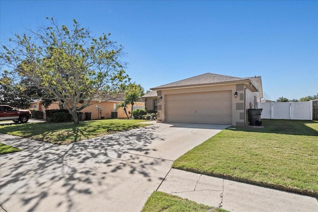 ranch-style home featuring a front lawn, fence, stucco siding, a garage, and driveway