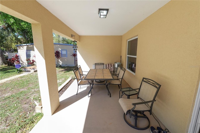 view of patio featuring outdoor dining space