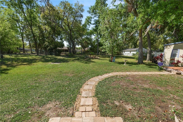 view of yard featuring fence