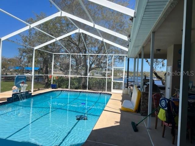 pool featuring a patio area and a lanai