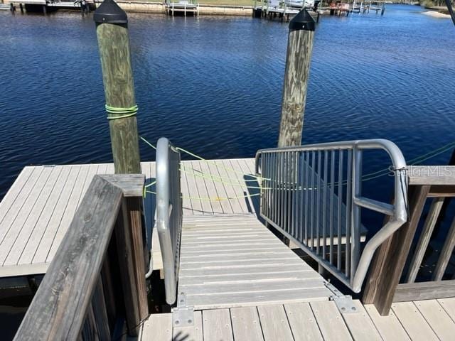 view of dock with a water view