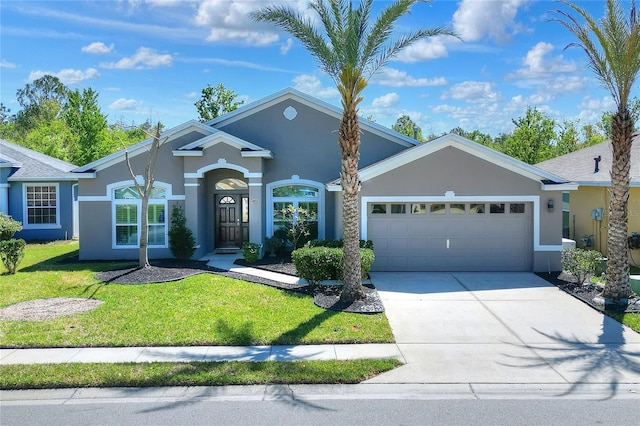 ranch-style home with stucco siding, driveway, a front lawn, and a garage