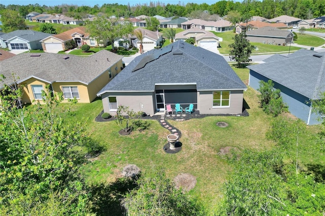 drone / aerial view with a residential view