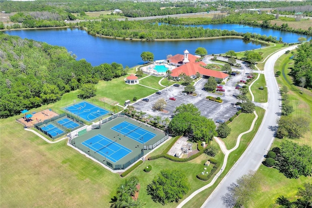 birds eye view of property with a water view