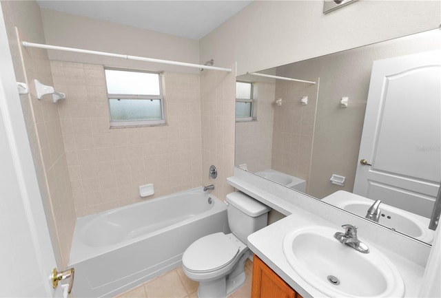 bathroom with tile patterned floors, shower / bathing tub combination, toilet, and vanity