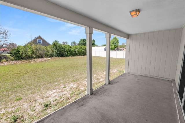 view of patio featuring fence