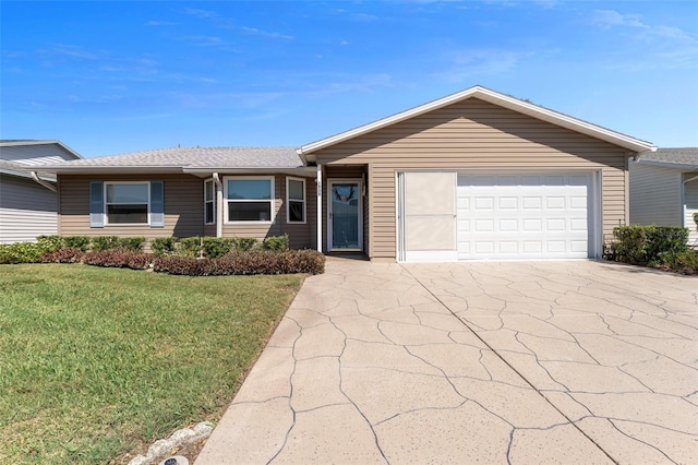 ranch-style house with a garage, roof with shingles, concrete driveway, and a front lawn