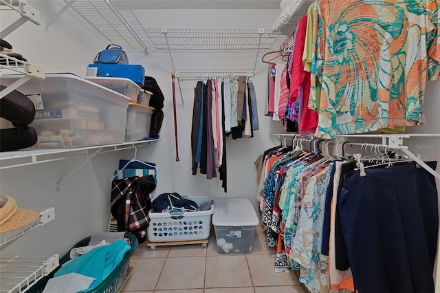 spacious closet with tile patterned flooring