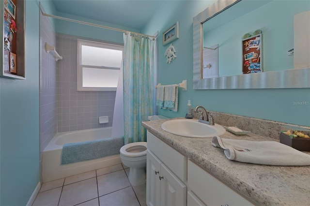 full bathroom with tile patterned flooring, toilet, vanity, and shower / tub combo