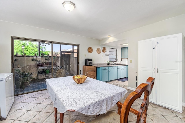 dining room with light tile patterned flooring