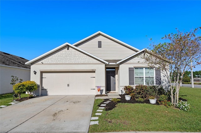 ranch-style home with a garage, concrete driveway, and a front yard