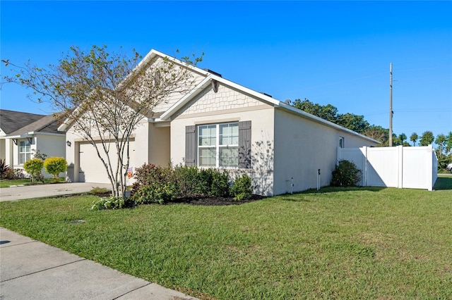 view of front facade with stucco siding, an attached garage, concrete driveway, and fence