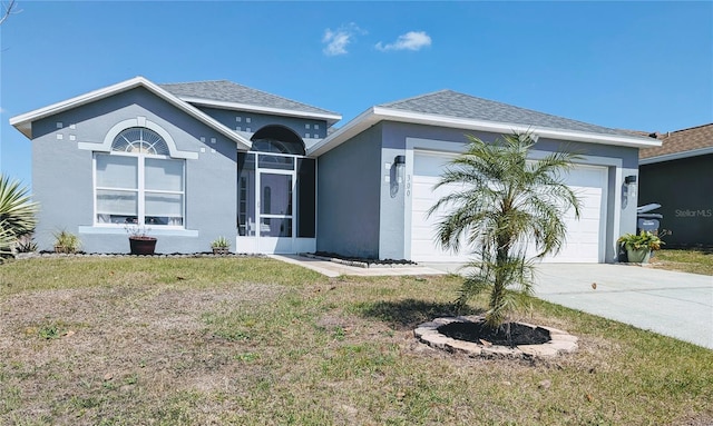 ranch-style house with stucco siding, a front lawn, concrete driveway, an attached garage, and a shingled roof