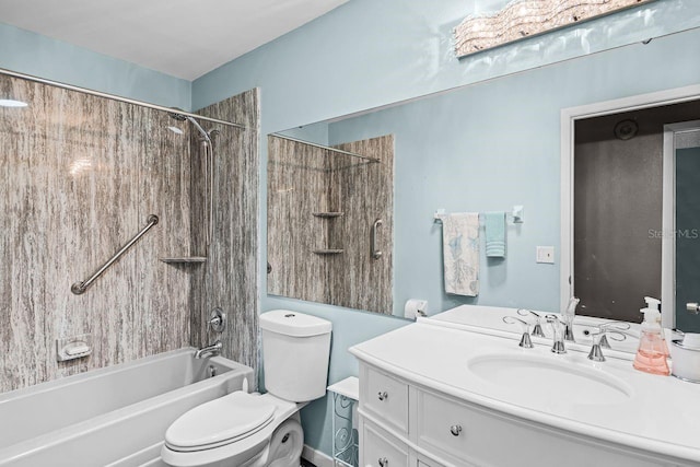 bathroom featuring bathtub / shower combination, toilet, and vanity