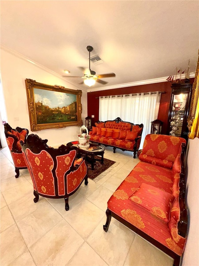 living area with visible vents, ornamental molding, a ceiling fan, and tile patterned flooring