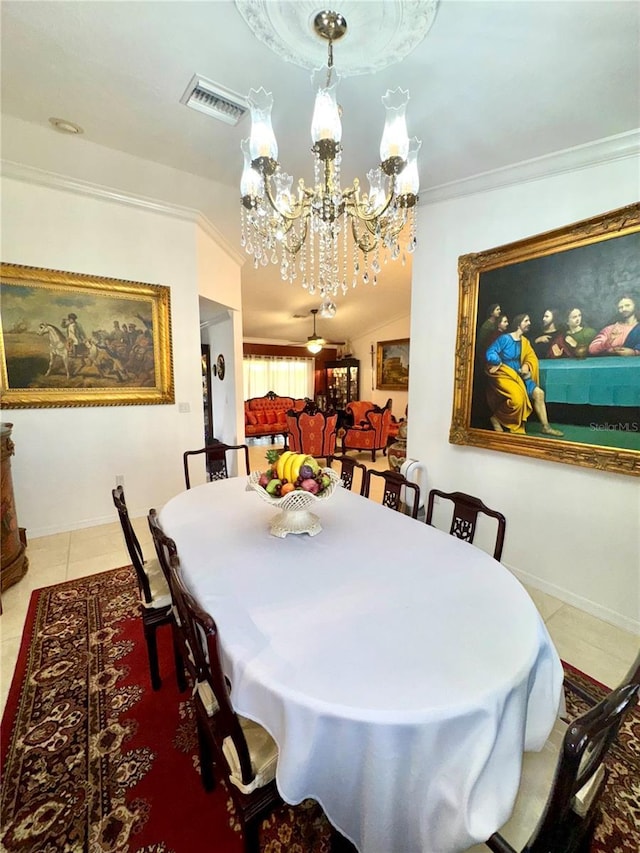 dining space featuring tile patterned floors, visible vents, a notable chandelier, ornamental molding, and lofted ceiling