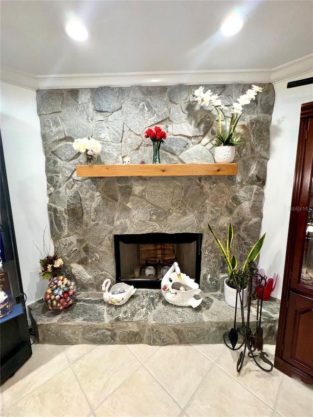 details featuring a fireplace and crown molding