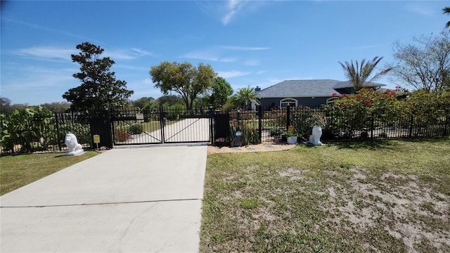 223 S Landry Rd, Avon Park, FL 33825 - view of gate with fence and a lawn