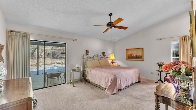 carpeted bedroom with a ceiling fan, baseboards, vaulted ceiling, a textured ceiling, and access to outside