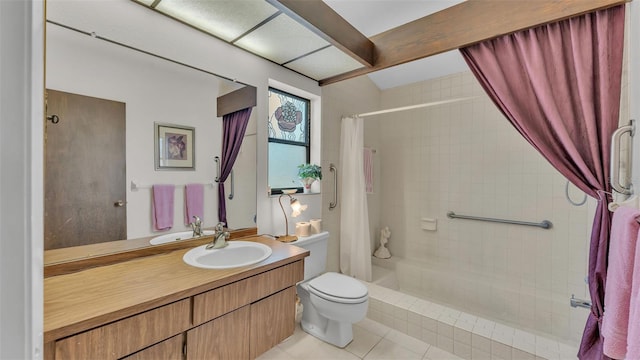 bathroom featuring tile patterned floors, tiled shower, toilet, and vanity