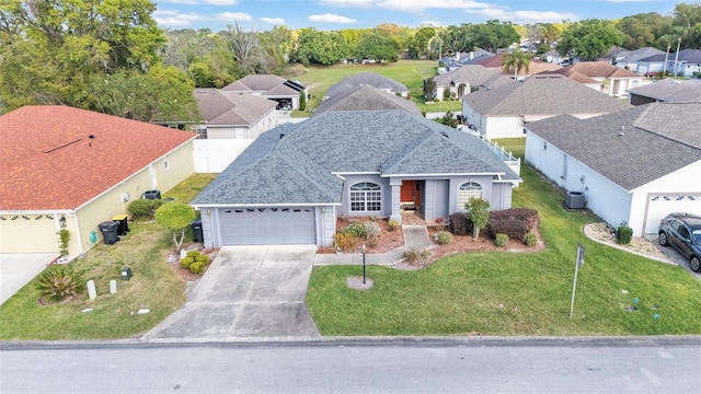 birds eye view of property with a residential view