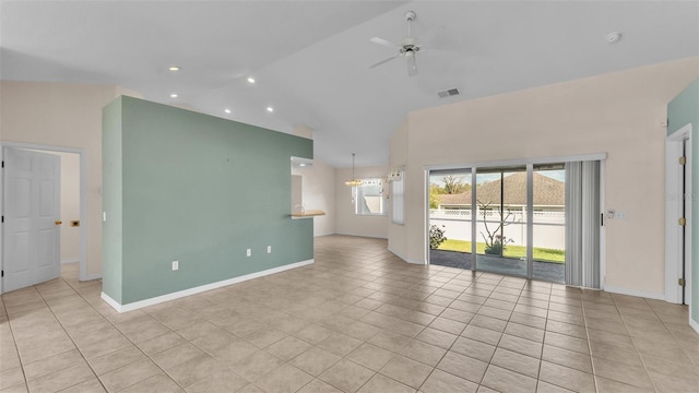 unfurnished living room with light tile patterned flooring, visible vents, baseboards, and ceiling fan