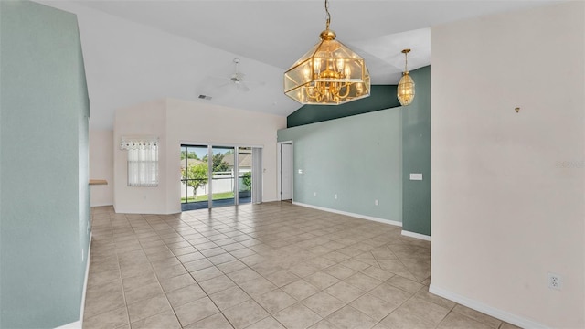 empty room featuring visible vents, ceiling fan, baseboards, vaulted ceiling, and light tile patterned floors