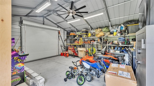 garage featuring a ceiling fan and metal wall