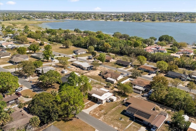 aerial view with a residential view and a water view