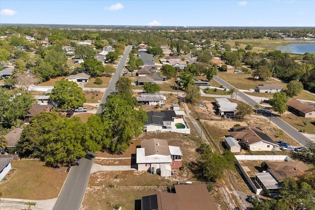 aerial view with a residential view and a water view