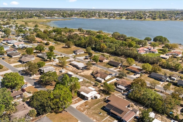 aerial view with a residential view and a water view