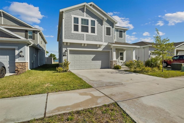 craftsman house with a front yard, driveway, an attached garage, stucco siding, and stone siding