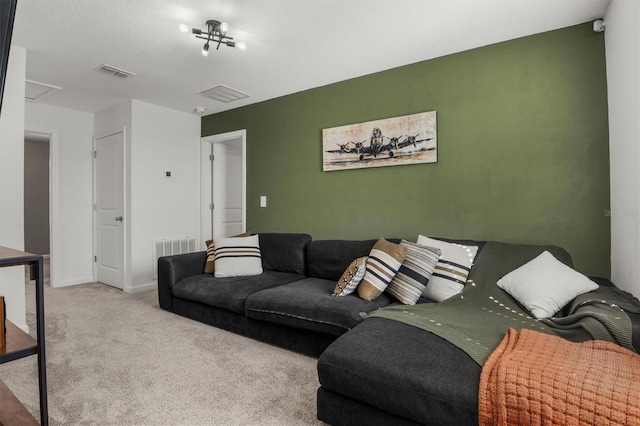 living room featuring carpet flooring, baseboards, and visible vents