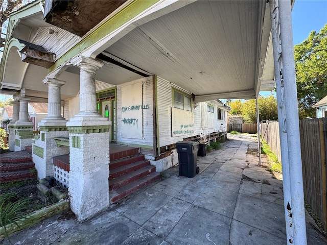 view of patio with fence