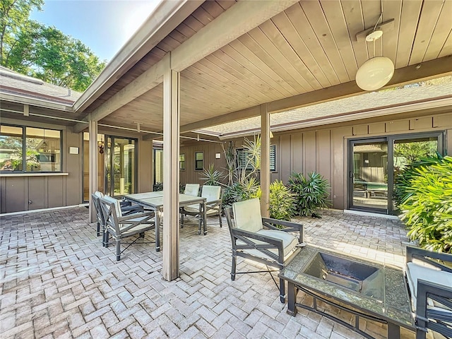 view of patio featuring outdoor dining area