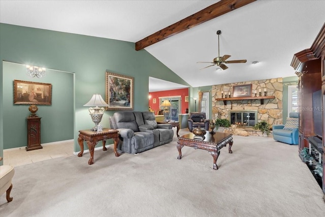 living area with beamed ceiling, carpet floors, a stone fireplace, baseboards, and ceiling fan