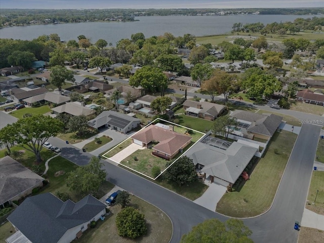 aerial view featuring a water view and a residential view