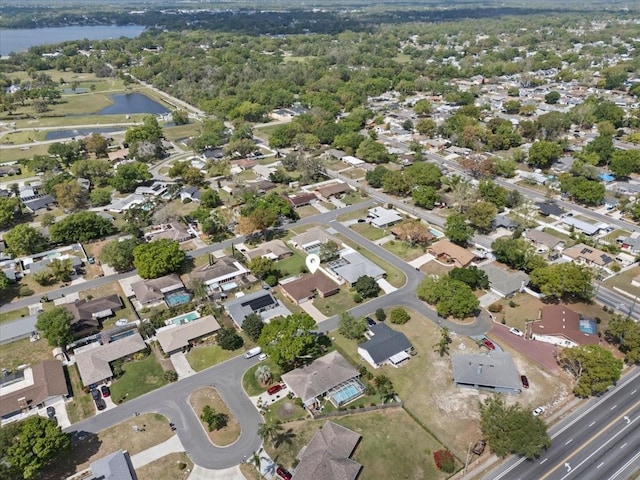 bird's eye view with a water view and a residential view