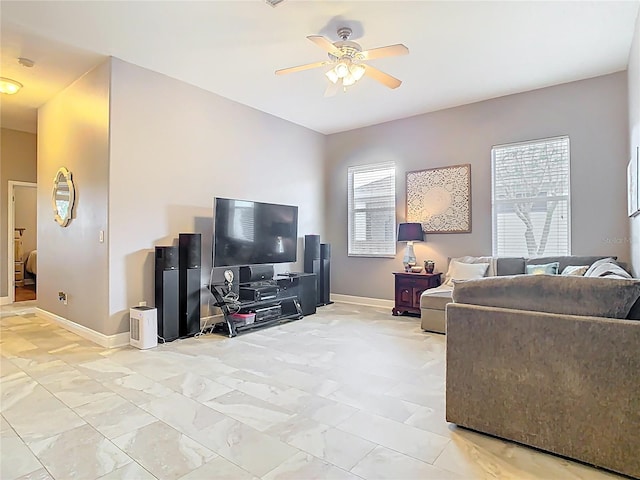 2420 Windchaser Ct, Melbourne, FL 32904 - living room with ceiling fan and baseboards