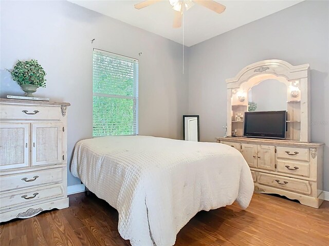 2420 Windchaser Ct, Melbourne, FL 32904 - bedroom featuring wood finished floors, baseboards, and a ceiling fan