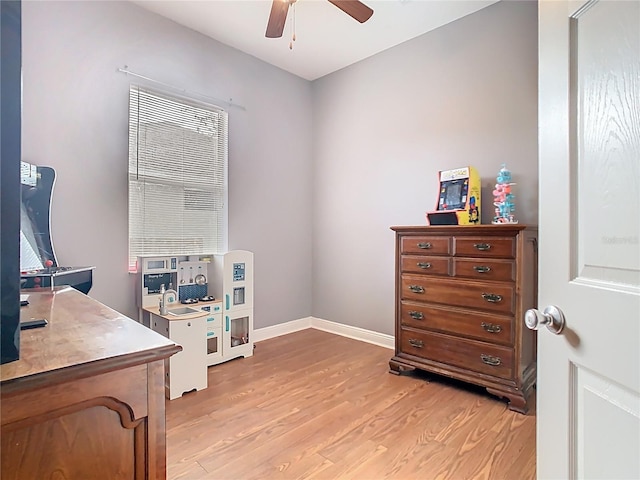 2420 Windchaser Ct, Melbourne, FL 32904 - interior space with light wood-style floors, baseboards, and a ceiling fan
