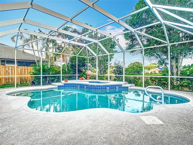 2420 Windchaser Ct, Melbourne, FL 32904 - view of pool with a patio area, fence, an in ground hot tub, a fenced in pool, and a lanai
