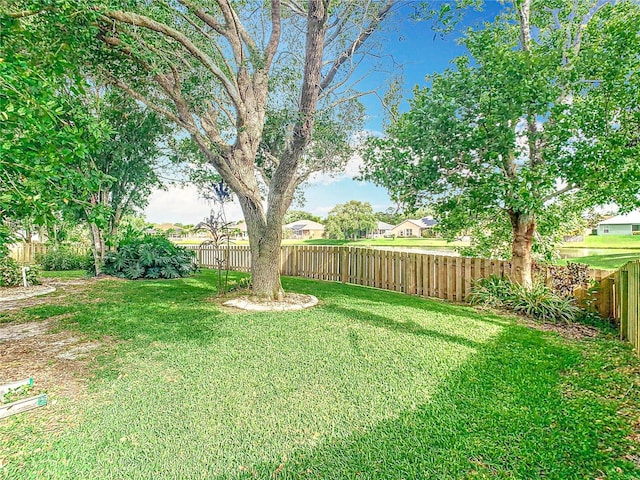 2420 Windchaser Ct, Melbourne, FL 32904 - view of yard featuring a fenced backyard