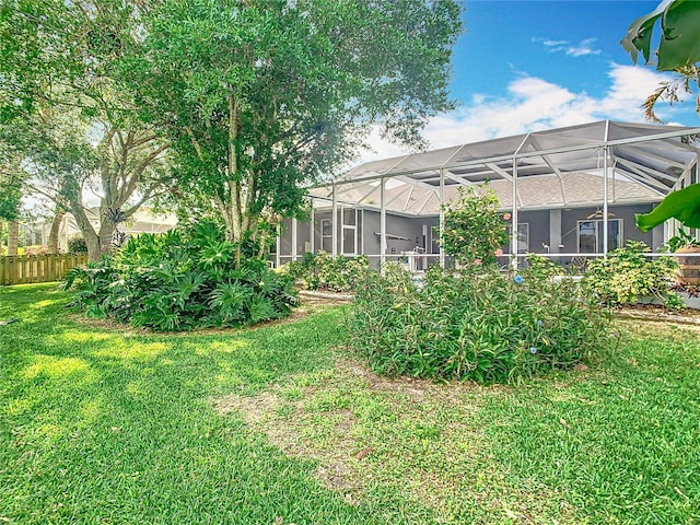 2420 Windchaser Ct, Melbourne, FL 32904 - view of yard with glass enclosure and fence
