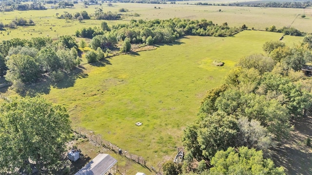 birds eye view of property featuring a rural view