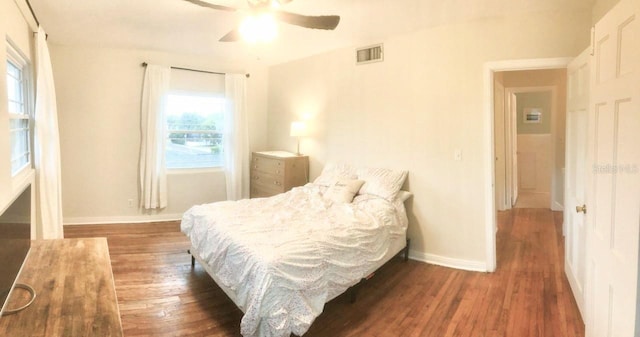 2816 Fairmount Ave, Lakeland, FL 33803 - bedroom featuring wood finished floors, multiple windows, and ceiling fan