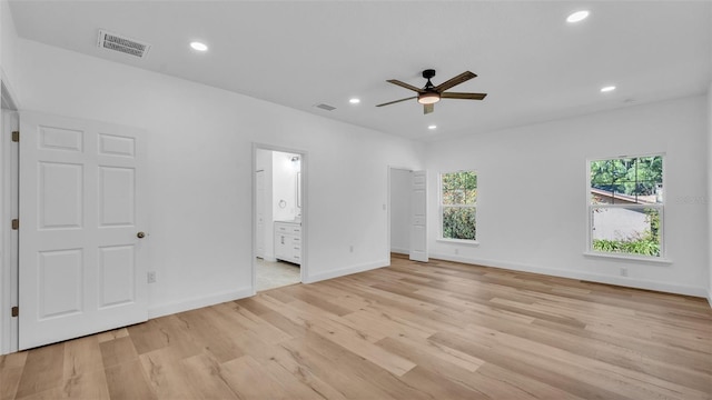 unfurnished bedroom featuring light wood finished floors, baseboards, visible vents, and recessed lighting