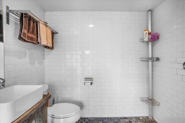 8922 Pritcher Rd, Lithia, FL 33547 - bathroom with toilet, tile walls, and vanity