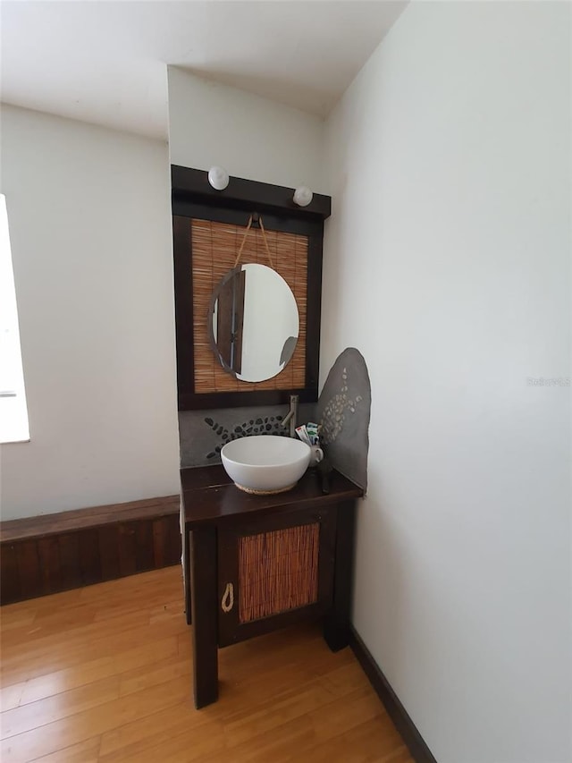 8922 Pritcher Rd, Lithia, FL 33547 - bathroom with wood finished floors and vanity