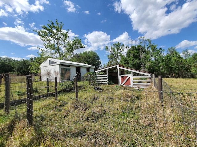 8922 Pritcher Rd, Lithia, FL 33547 - view of yard with an outbuilding